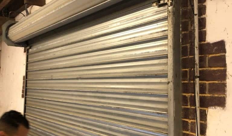 Ajout du moteur pour un rideau métallique à Paris 5