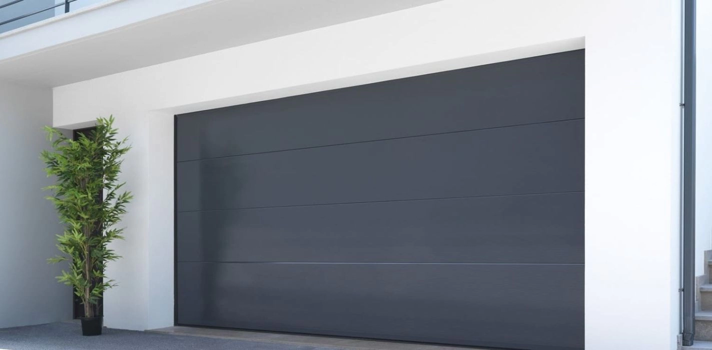 Image Comment bloquer une porte de garage sectionnelle ?