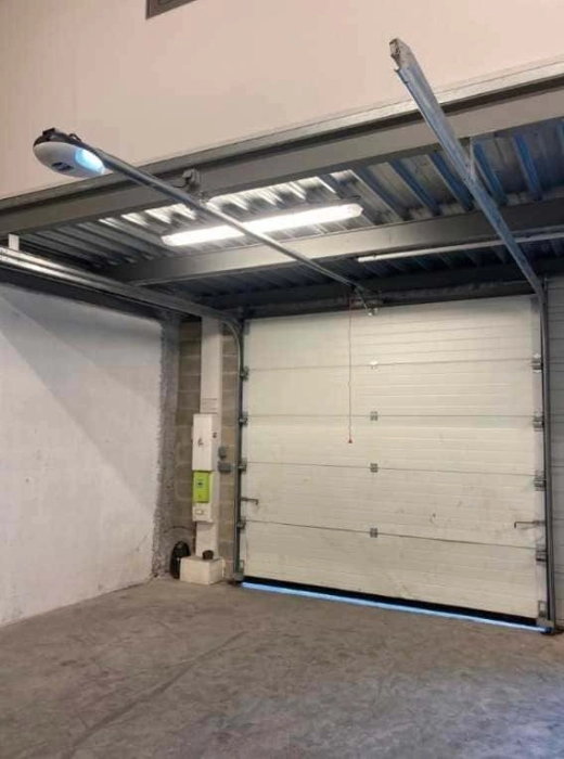 réparation de portes sectionnelles à 92
