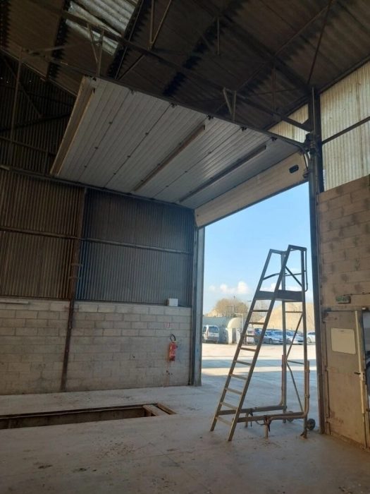 Réparation porte sectionnelle à Magny-en-Vexin