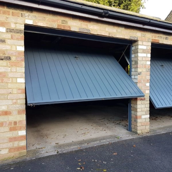 Réparation porte de garage sectionnelle à Saint Mandé