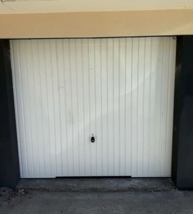 Réparation porte de garage basculante manuelle